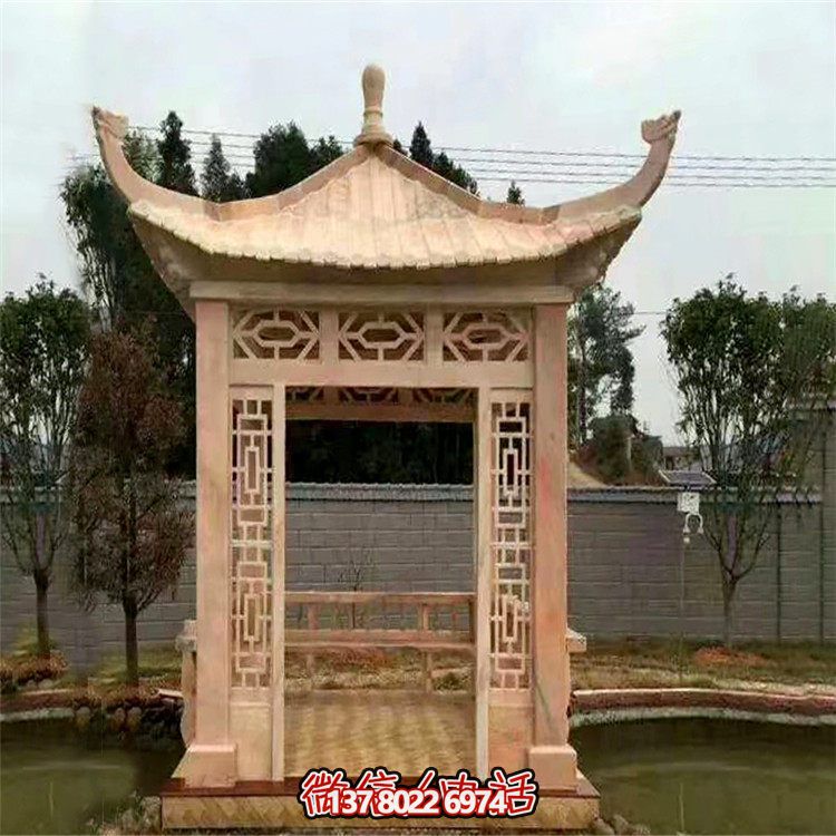 紅石雕鏤涼亭，晚霞中空中創意雕塑